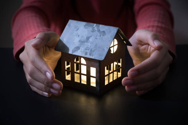 istock Model house in the palm 1134520452