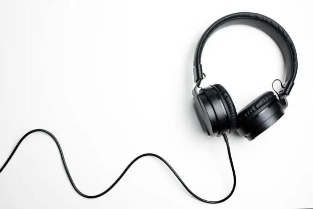 Photo of Black headphones isolated on the white background