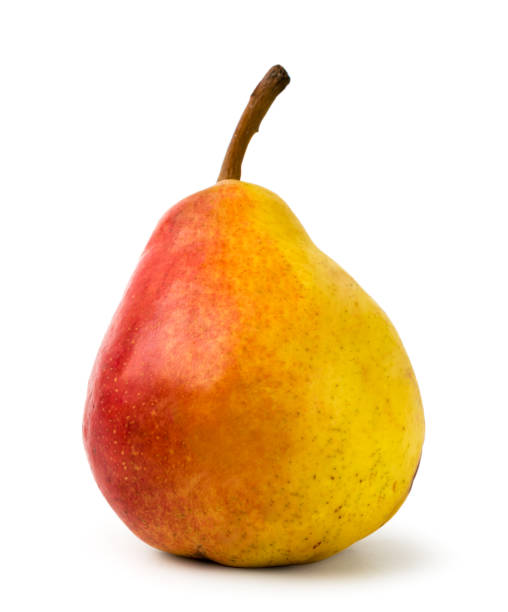 istock Ripe pear close-up on a white. isolated 1134522999