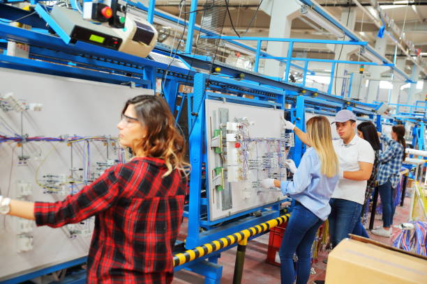 istock Female manuel workers team working on the production line in factory 1134525652