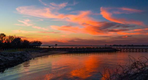 istock Pink clouds near the Harbor 1134528349