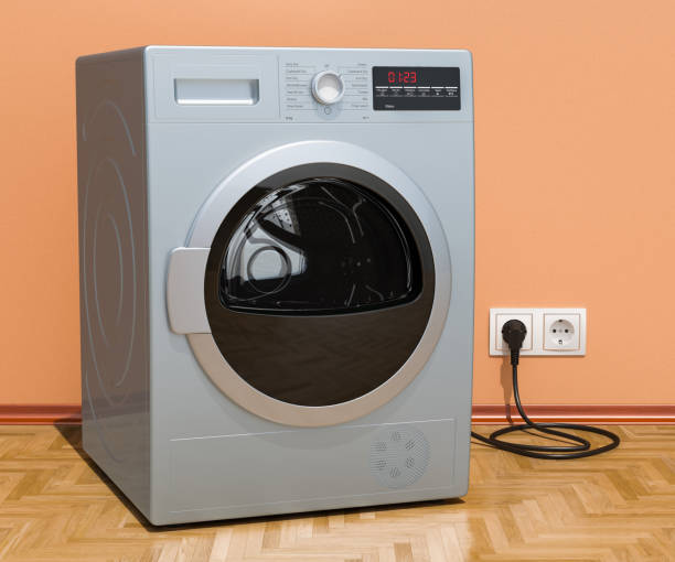 Clothes dryer in interior, 3D rendering Clothes dryer in interior, 3D rendering tumble dryer stock pictures, royalty-free photos & images