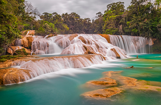 The magnificent cascades and waterfalls of Agua Azul in the tropical rainforest of the Chiapas state near Palenque, Mexico.