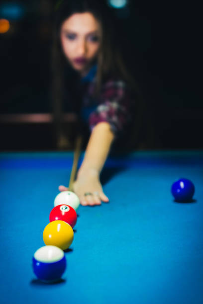 istock Woman and plays billiard and have fun. 1134534508