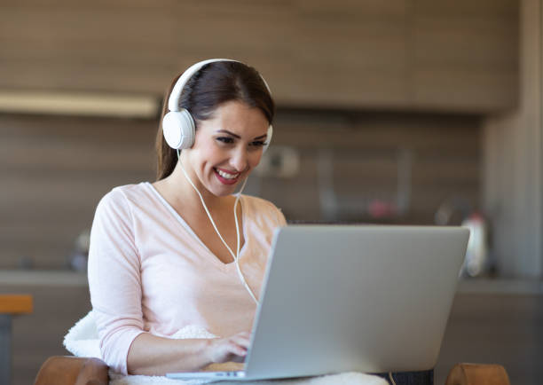 istock Smiling student studying for an exam at home 1134537561