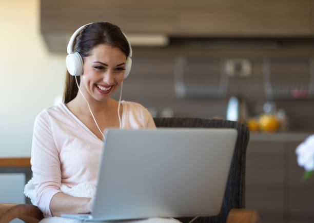 istock Smiling student studying for an exam at home 1134537590