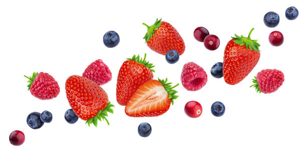 istock Flying berries isolated on white background with clipping path, different falling wild berry fruits, collection 1134550069