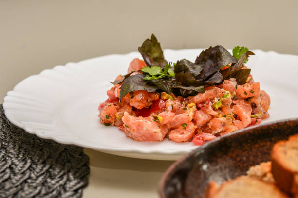 istock Fresh Salmon Tartar with pistachio, basil and herbs 1134559212