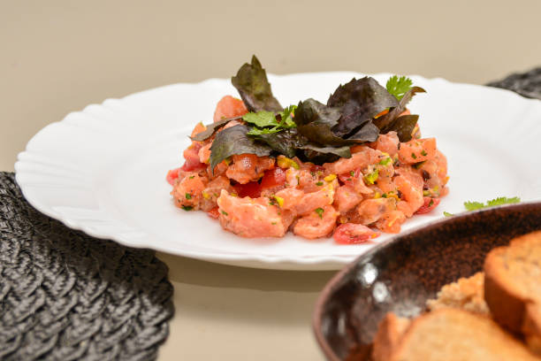 istock Fresh Salmon Tartar with pistachio, basil and herbs 1134559213