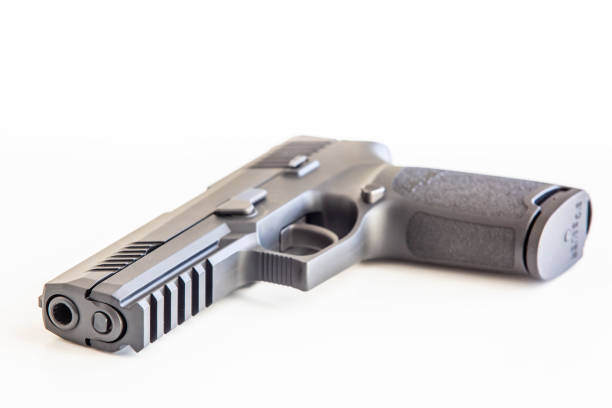 istock Modern handgun white background isolated close up 1134559251