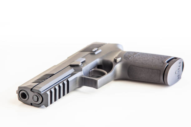 istock Modern handgun white background isolated close up 1134559252