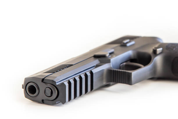 istock Modern handgun white background isolated close up 1134559257