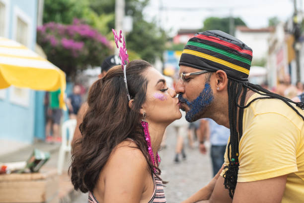 istock Couple kissing at Carnival 1134559912