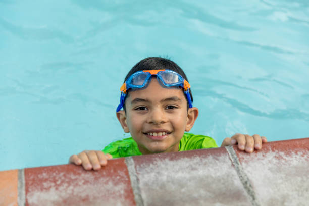 istock Happy Child in a Swimming Pool 1134561212