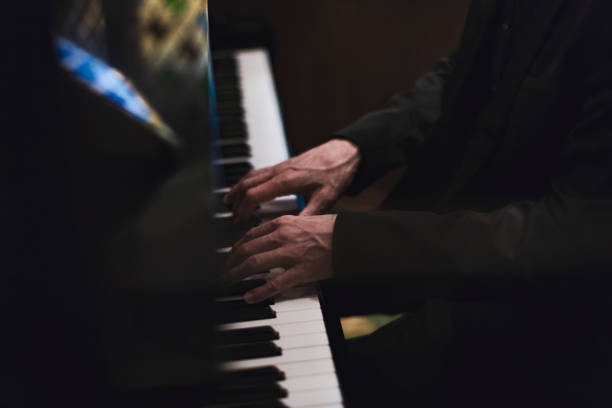 Hands of a pianist playing piano