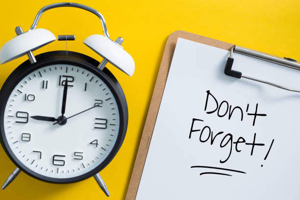 Don't Forget Text With Alarm Clock Aside Don't Forget notice reminder words graphic concept. pics of a letter t in cursive stock pictures, royalty-free photos & images