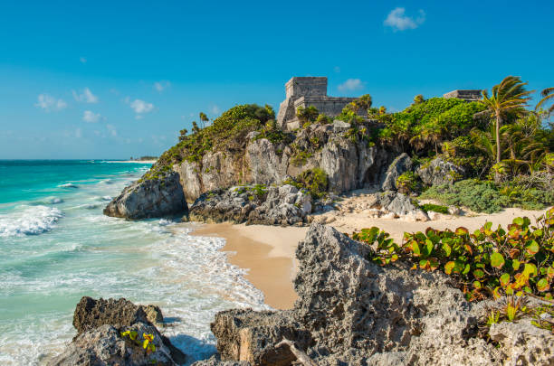 Mayan Ruins of Tulum, Mexico The Mayan archaeological site of Tulum with its famous beach by the Caribbean Sea, Quintana Roo state, Yucatan Peninsula, Mexico playa del carmen stock pictures, royalty-free photos & images