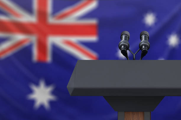 istock Podium lectern with two microphones and Australia flag in background 1134585261