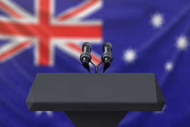 istock Podium lectern with two microphones and Australia flag in background 1134585264