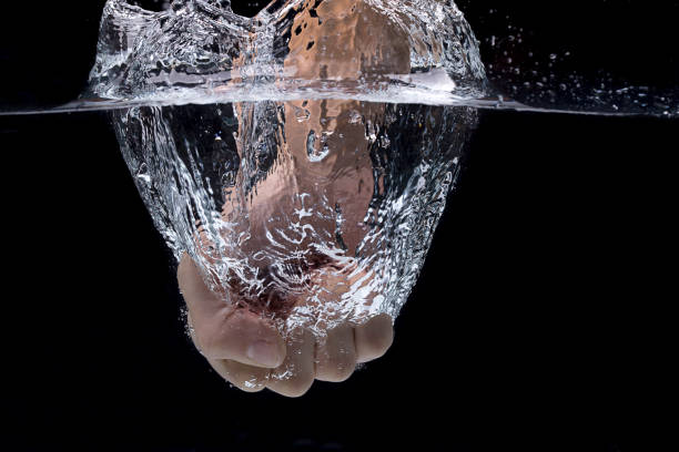 istock Fist punches into the ater. 1134587118