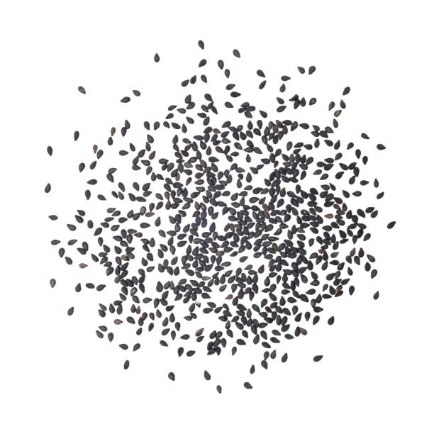 sementes de gergelim pretas em um fundo branco - white sesame seed - fotografias e filmes do acervo