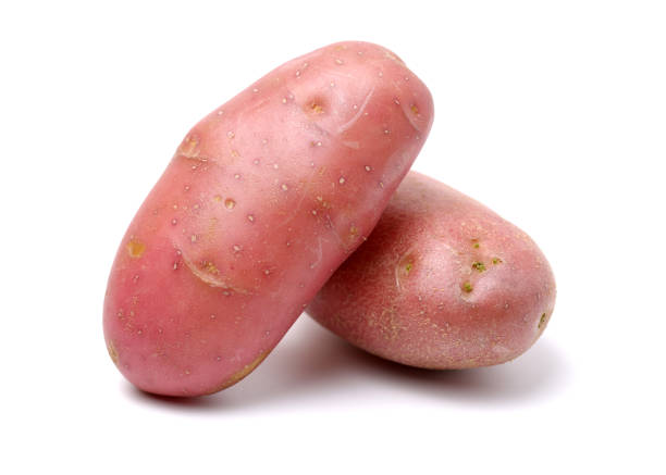 Three colors small potatoes isolated on white