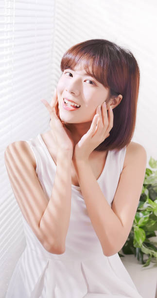 istock Young asian woman enjoy sunshine 1134594618