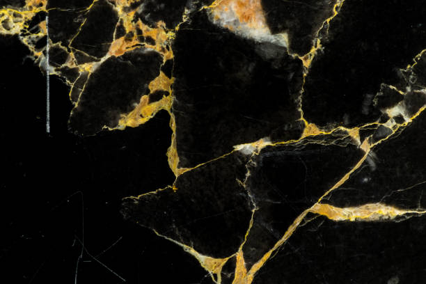 istock golden black marble texture pattern , luxury design by natural stone on surface of slab 1134595748