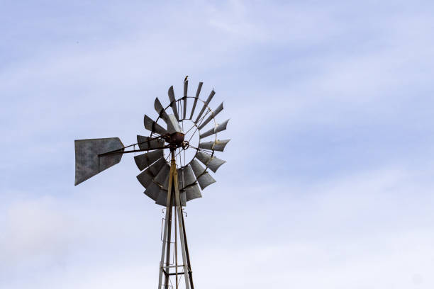 istock Old water pumping windmill with a tiny bird on top, Joseph Grant County Park, San Jose, California 1134596330