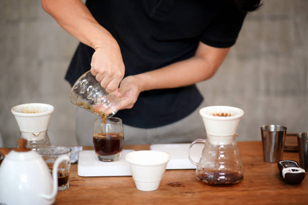 istock Barista making drip coffee and accessories on the table 1134599344