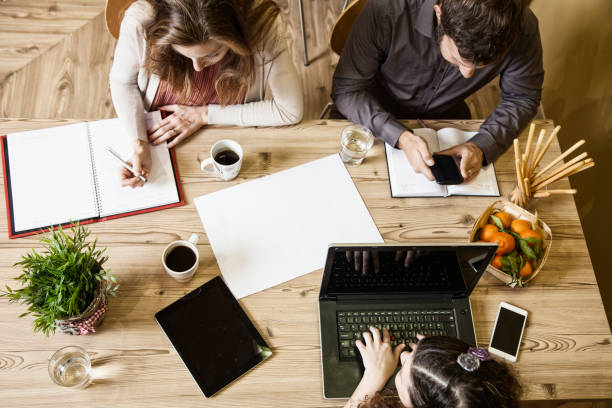 istock Busy business people working in office, top view 1134601035