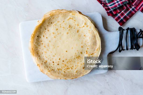 Large Stack Of Plain Thin Pancake Crepes Stock Photo - Download Image Now - Breakfast, Candlemas, Cooking