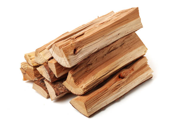istock Pile of firewood isolated on a white background 1134604118