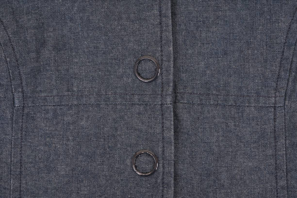 istock Gray fabric background with seam and button up. 1134607220