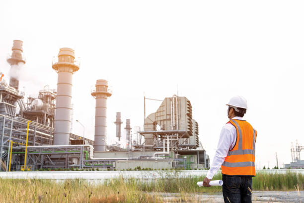 istock businessman is used smart phone control engineering at power plant 1134614832