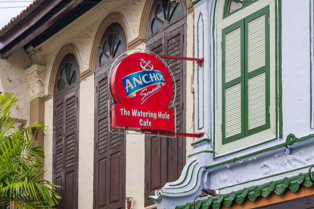 Malacca, Malaysia - 8th June 2010: Sign for the watering hole cafe. The city has many bars and restaurants catering to tourists
