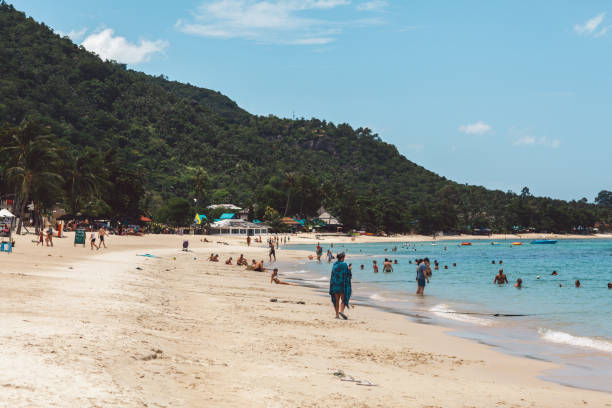 istock People At Beach Against Sky 1134631953
