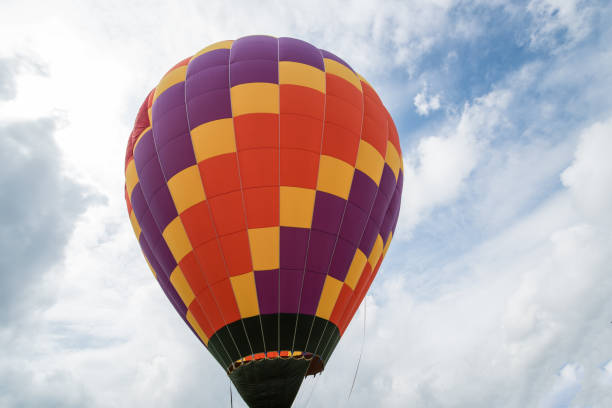 istock Coloured Hot Balloon, Natural and Blue Sky Background Composition 1134633657