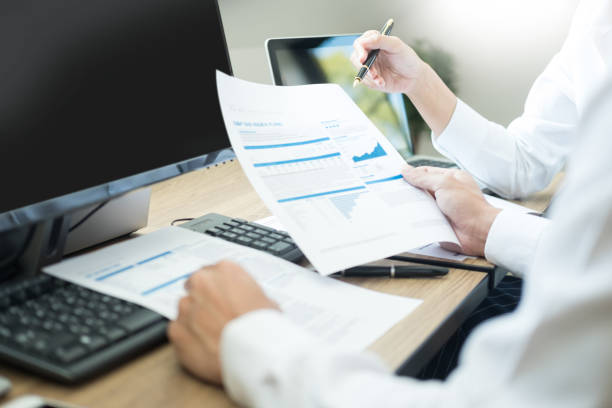 istock Cropped Image Of Colleagues Doing Paperwork In Office 1134635373