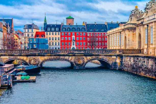 colorful houses, ancient bridge and river. Copenhagen, Denmark, Europe