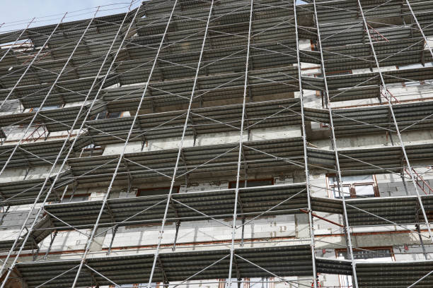 istock new building under construction, scaffolding and concrete 1134641683