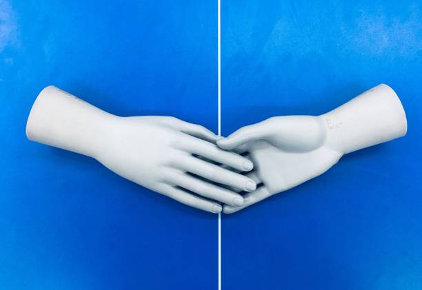 istock Close-Up Of Mannequin Hands On Blue Background 1134646236