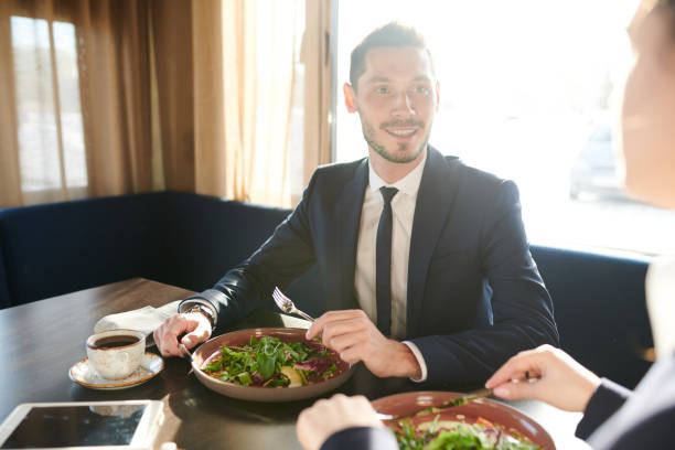 istock Talking to colleague by lunch 1134650834