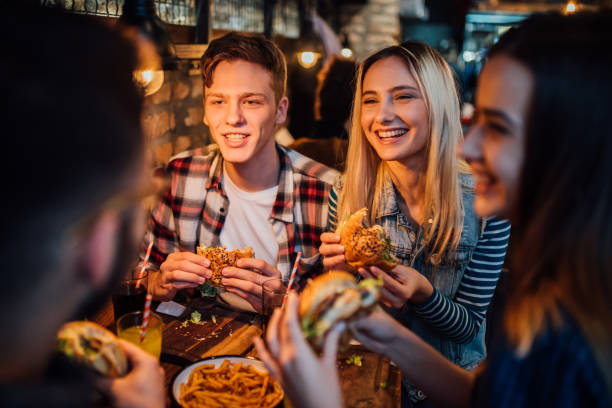 istock Friends having hamburgers 1134651036