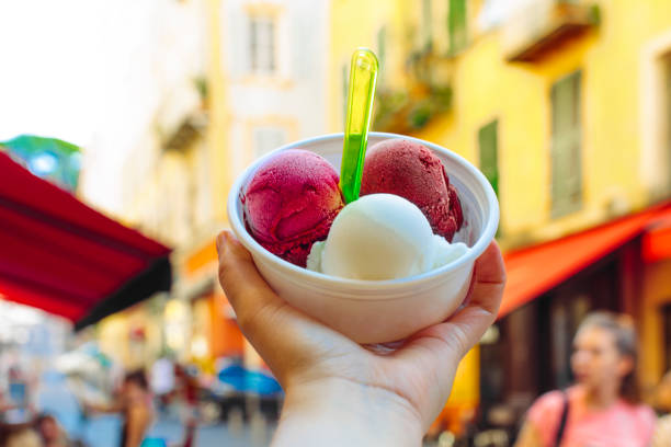 istock Young man holding an ice cream bowl 1134658071