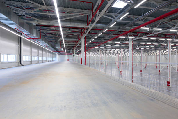istock Interior of an empty modern warehouse building 1134659311