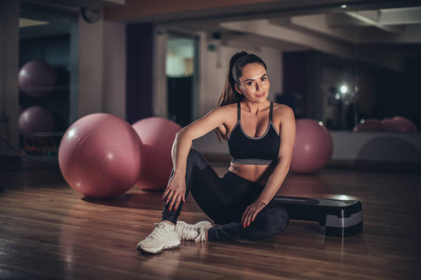 istock Beautiful woman in the gym 1134659984