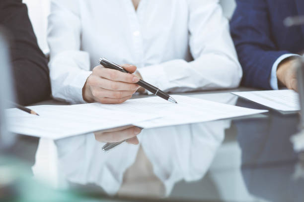 istock Bookkeepers team or financial inspectors  making report, calculating or checking balance. Group of people at work. Business operations concept 1134660181
