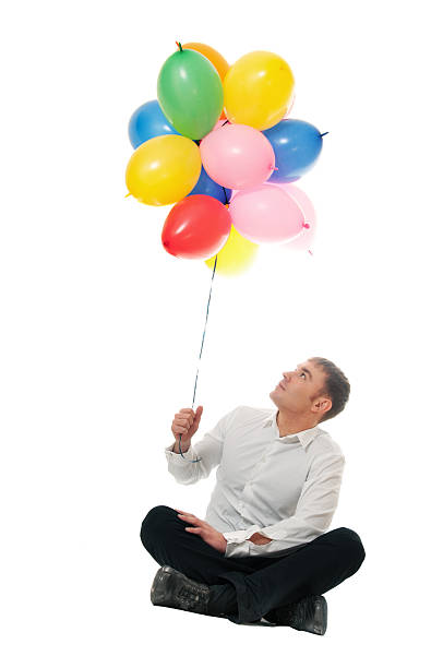 istock Businessman with balloons 113466075