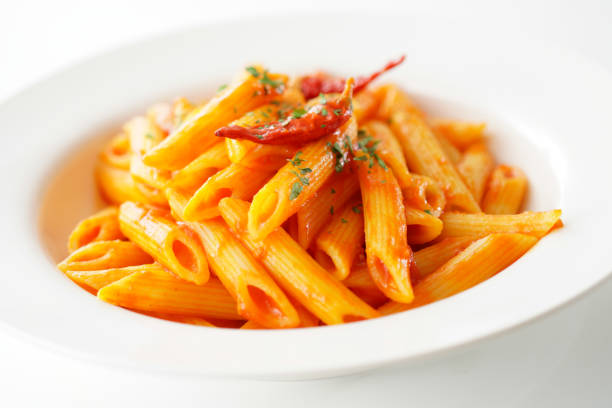 istock Pasta pens in angry sauce. 1134661520
